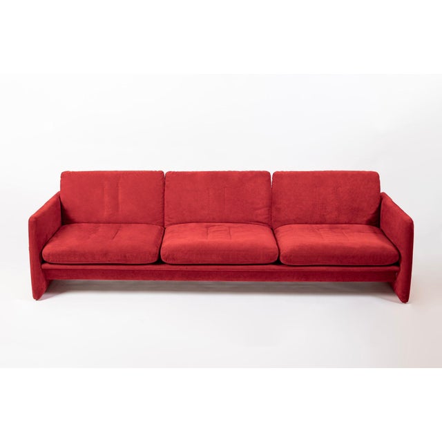 This rare Italian modern three-seat red “Simone” sofa attributed to Dino Gavina and Maria Simoncini was made in Italy...