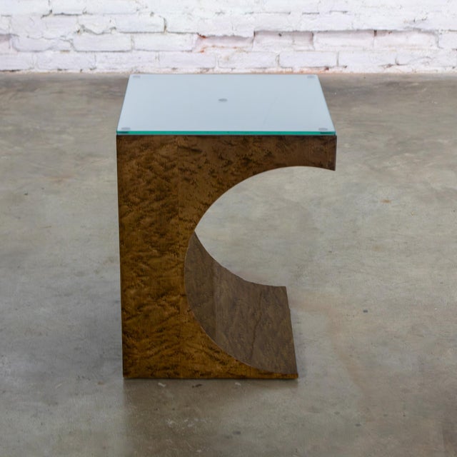 Gorgeous vintage Modern geometric half-moon, crescent, or C shaped end or side table composed of a burl wood frame, heavy...