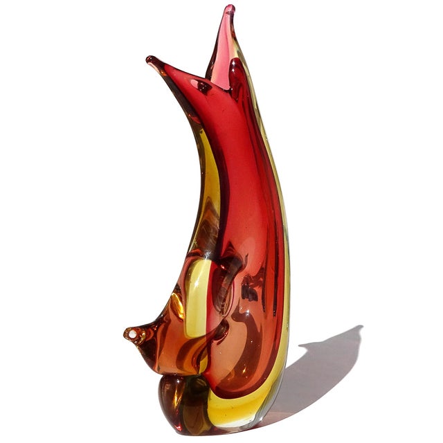 Beautiful vintage Murano hand blown Sommerso red yellow orange Italian art glass decorative sculptural flower vase. The...