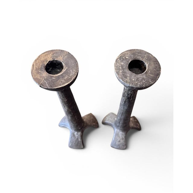 An exceptional pair of sculptural bronze candle holders attributed to Horst Dalbeck, crafted in Germany during the 1970s....