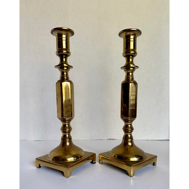 Dating to the 1960s–1970s, this handsome pair of American-made candlesticks is crafted of solid brass with a classic...