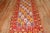Antique Turkish milas runner featuring a Caribbean blue ground, accents in bright red and saffron, Measures: 3'7" x 13'6".
