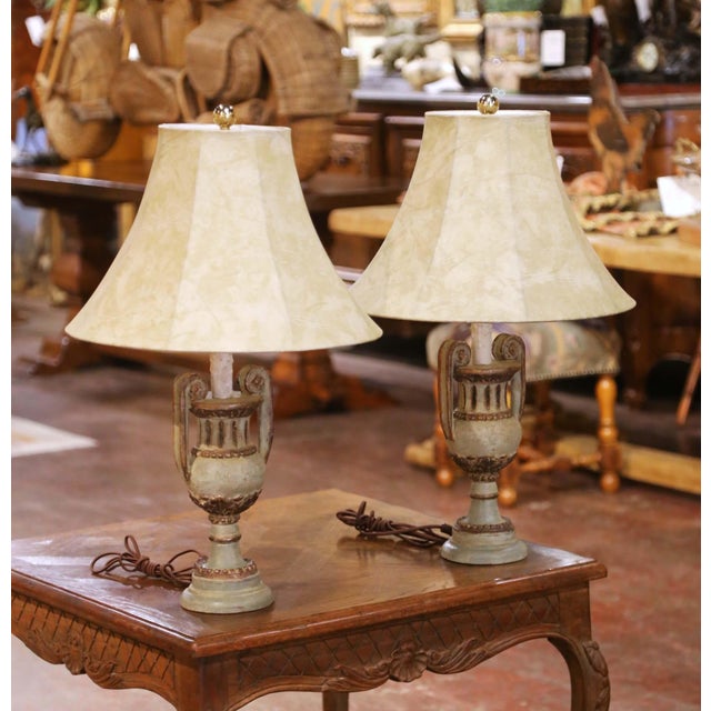 Decorate a console, buffet, or bedside tables with this elegant pair of vintage Neoclassical table lamps. Crafted circa...