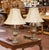 Decorate a console, buffet, or bedside tables with this elegant pair of vintage Neoclassical table lamps. Crafted circa...