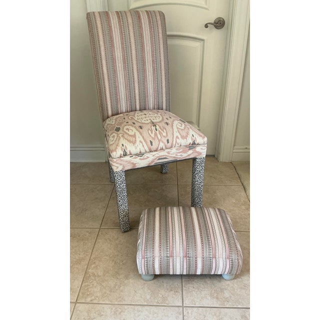 Make a bold, sophisticated design statement with this custom-upholstered accent chair and coordinating low footstool....
