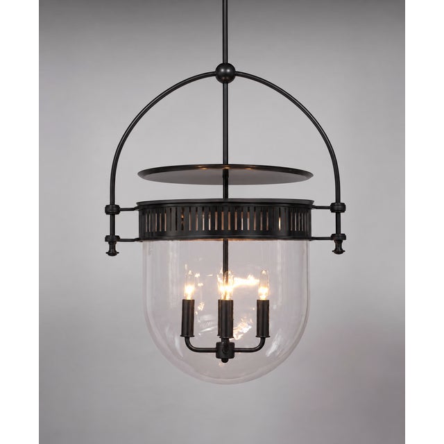 Pair of authentic Urban Electric Co. Dover Bell pendant lights in black with clear glass. Excellent pre-owned condition...