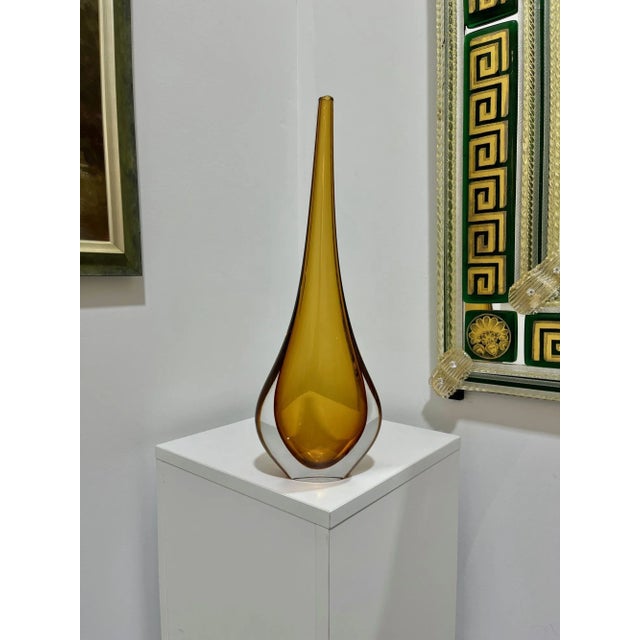 The Goccia design is a very popular classic vase hand made at the Murano Glass Furnaces of Robert Beltrami, former Master...