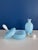 Enhance your bathroom or dressing table with this old set in blue opaline. Composed of a delicate bottle with stopper and...