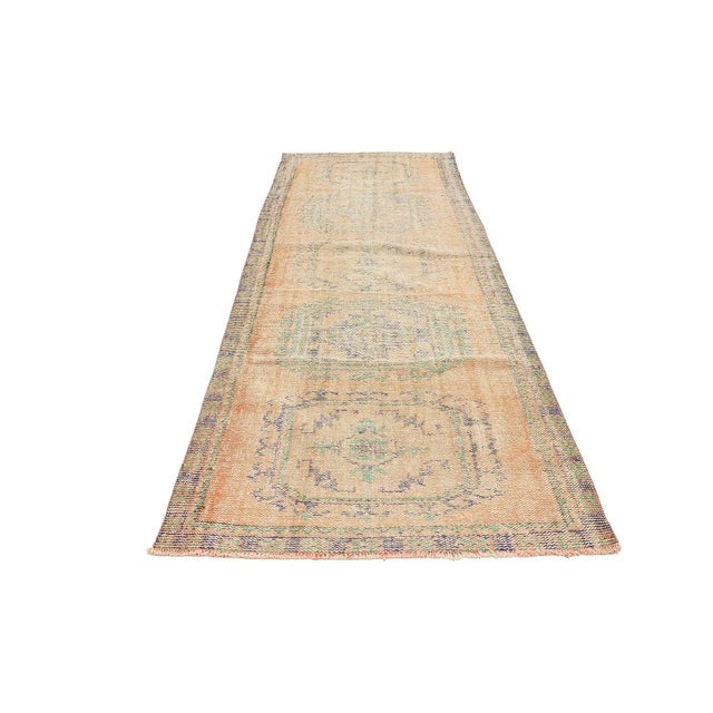 Handknotted vintage wool rug from Oushak region of Turkey. Approximatelly 50-60 years old. In very good condition.