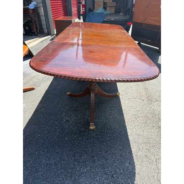 The Mahogany Antique Style 3 Pillar Dining Table exudes elegance and class with its solid mahogany top and regency style...