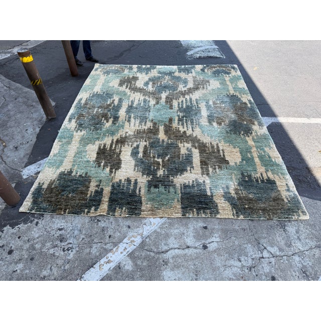 Design Plus Gallery presents a 8ft 1in x 9ft 11in Ithaca Irate Area Rug from Classic Home. The tribal style of pattern...