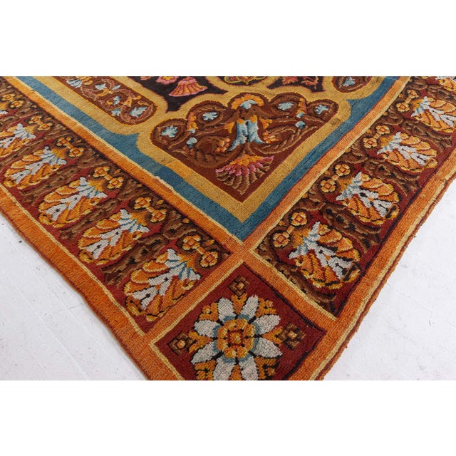 This stunning 1920s English Axminster rug captures the exuberance and craftsmanship characteristic of the finest British...