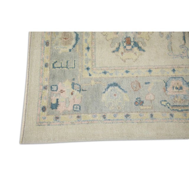 Modern Early 21st Century Cream Handwoven Wool Turkish Oushak Rug in Pink & Blue Floral Design 6'1" X 9'1" For Sale - Image 3 of 7