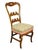 An 18th-C. period Louis XV Provincial fruitwood side chair with hand carved details.
