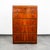 Beautiful highboy dresser in a burl walnut with metal handles. Unknown American maker.