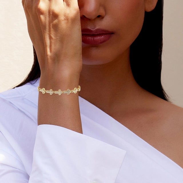 Don't miss your chance to bid on this bold, luxury 10K yellow gold cross link bracelet — a truly head-turning piece...