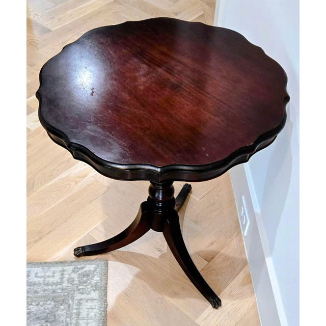 American Vintage Imperial Furniture Genuine Mahogany Scalloped Pedestal Table With Brass Paw Feet For Sale - Image 3 of 8