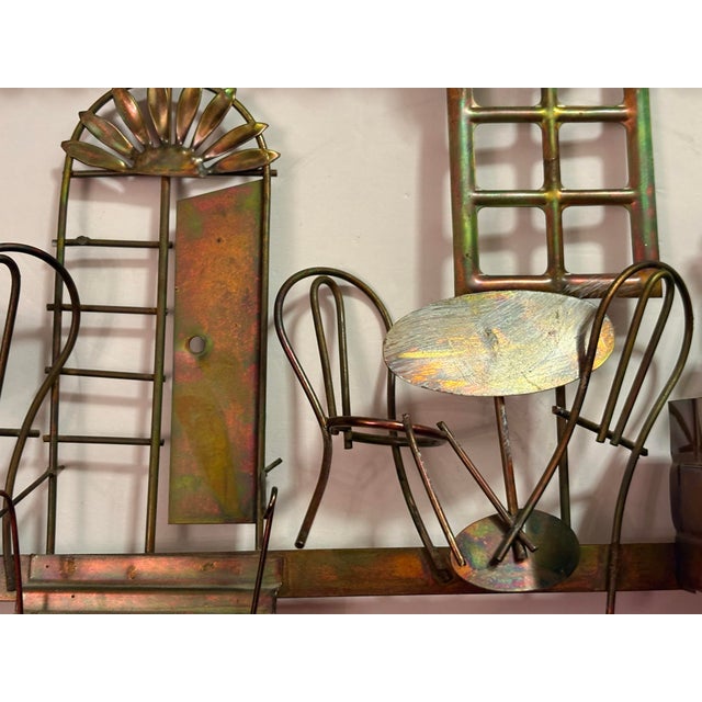 Brutalist metal wall sculpture of an outdoor bistro Café. This sculpture is a gorgeous patinated metal made famous by...