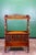A very fine example of a three-tiered antique English burl walnut music stand, with Canterbury base, circa 1860. Also...