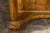 A French Napoléon III period walnut console table from circa 1860 with original marble top and carved gilt accents. This...