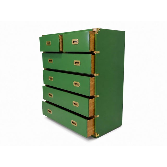 We love the undeniable Pop! Of this vintage campaign-style tall dresser by high-quality furniture maker Bernhardt, which...