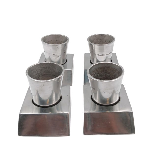 Unique mid-century modern style set of 4 pewter shot glasses with base stands by Michael Aram Base Stand Dimensions: 3”L x...