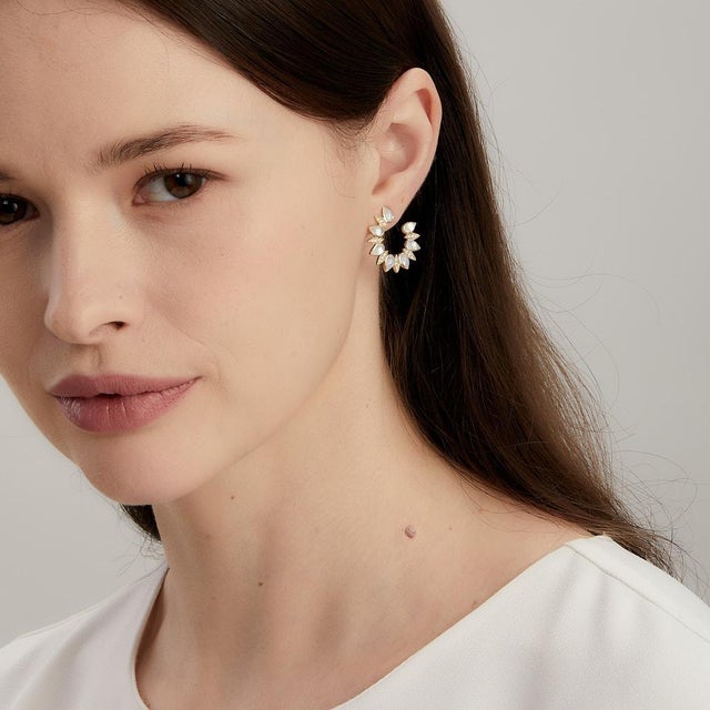 Created in 18 karat yellow gold Moon Quartz 3 carats approx. Diamonds 0.20 carat approx. 18 kyg butterfly backs Limited...