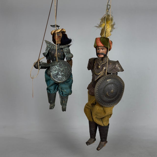 An exceptional testament to the centuries-old theatrical tradition of the opera dei pupi, perfect for discerning...