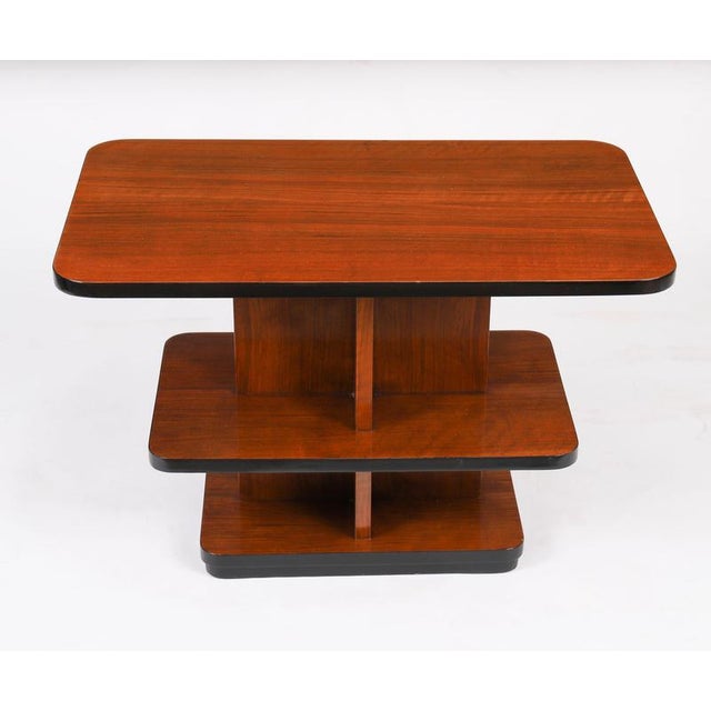 This is a superb antique Art Deco walnut coffee table, circa 1920 in date. The table top is rectangular in shape and...