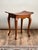 With its graceful saddle-shaped seat and honest craftsmanship, this antique Arts & Crafts footstool embodies the...