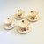 A set of 4 vintage porcelain teacups and saucers, made in Norway by Figgjo. Each piece features a lovely farmhouse and...