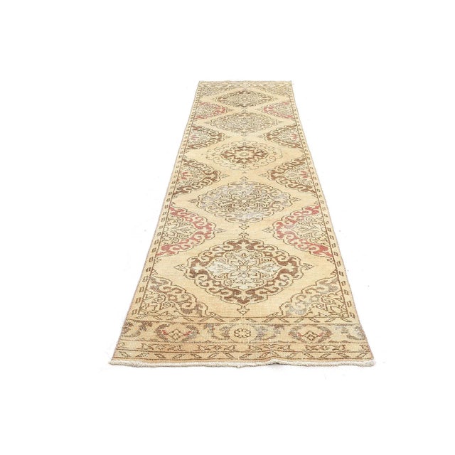 Handknotted vintage wool rug from Oushak region of Turkey. Approximatelly 50-60 years old. In very good condition.