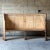 A traditional pine settle bench made at the turn of the century. Rectangular panels, clean lines, and gracious curves give...