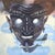 Sonem by Elena Burykina | Oil on panel Black mask with white eyes and a smiling mouth. For Sale