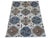 A tribal Kazak-design carpet on a soft ivory ground, scattered with folk animals. Large blue octagonal medallions with...