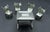 This marvelous antique miniature table and set of 4 chairs is created in 900 coin silver and was most likely Made in...