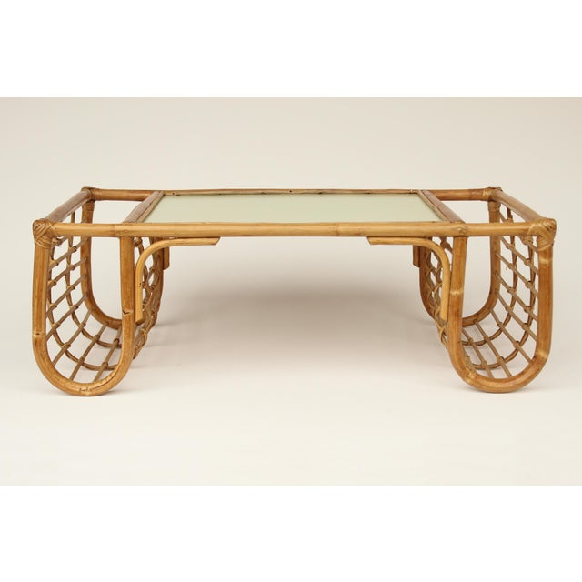 Vintage/Design Nightstand or bedside table made of rattan and a lime green stained wooden top. Made in Germany in the...