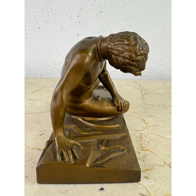 This is an early 20th century grand tour sculpture from Italy. The sculpture is titled death of a gladiator and was copied...
