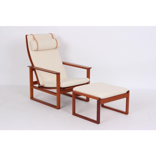 Børge Mogensen armchair and footstool in a rare, beautiful finish. Model numbers 2254 and 2248. Designed in 1956 and...