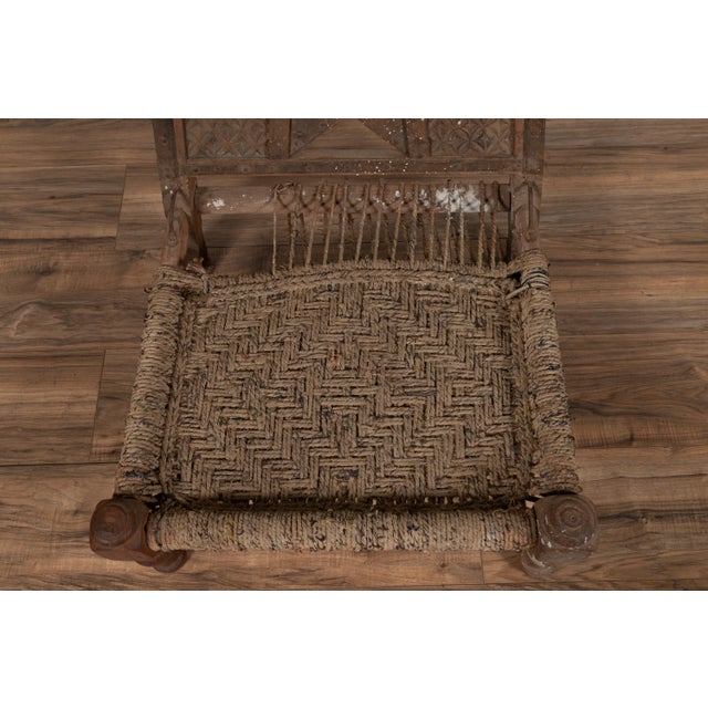 Rustic Indian Low Wooden Chair With Rope Seat and Weathered Appearance For Sale - Image 11 of 16