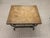 Mid-century Spanish-Mediterranean design cocktail table, uniquely covered in natural colored leather to and sides, with...
