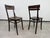 Set of 2 dining chairs by J&J Kohn in excellent original condition with signs of use.