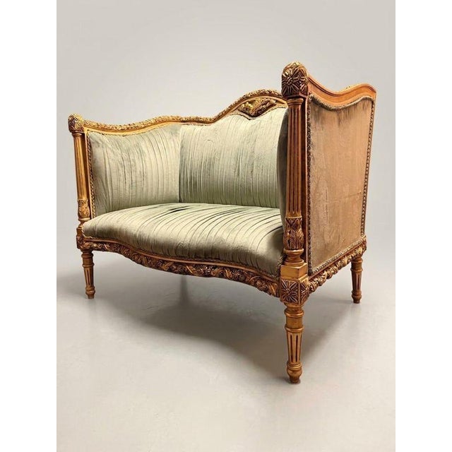 Bring classical sophistication to your space with this stunning Louis XVI style sofa. Crafted with a richly detailed...