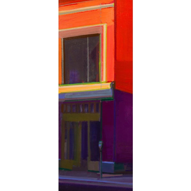 The artwork presents a striking urban scene, characterized by bold blocks of color that create a dynamic interplay between...