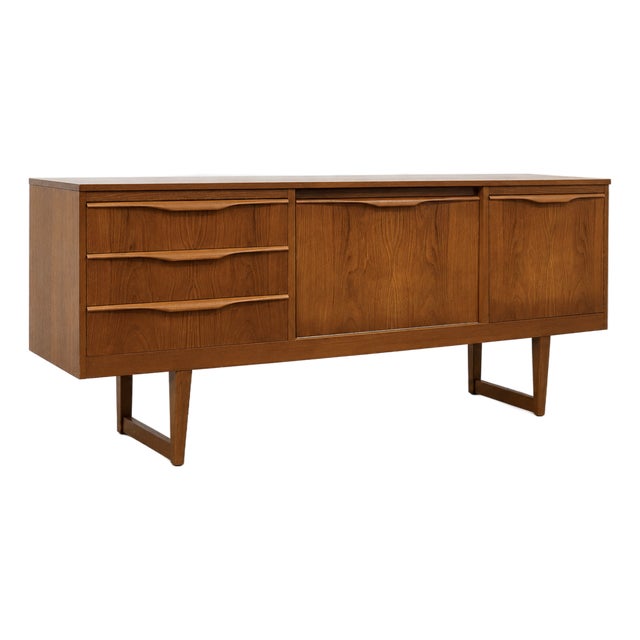 Mid Century Modern Teak Sled Leg Credenza | Scandinavian Sideboard | Danish Modern Buffet Cabinet, Made in England, C. 1960’s For Sale