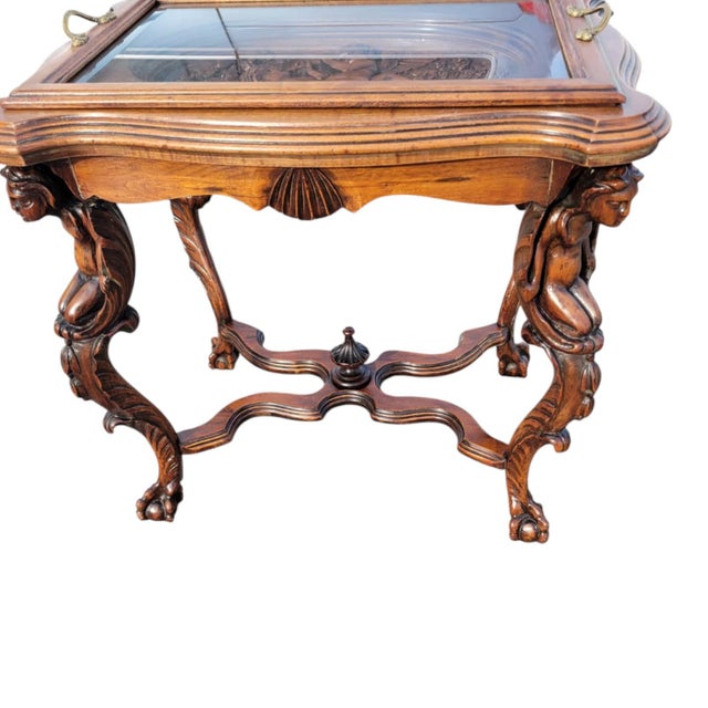 1920 Ornate Carved Angel Display Table With Glass Top and Sculptural Legs For Sale - Image 11 of 18