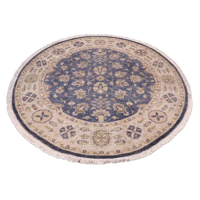 Transform your space with the Kafkaz Chobi Peshawar Round Hand‑Knotted Wool Rug, crafted by skilled Turkish artisans using...