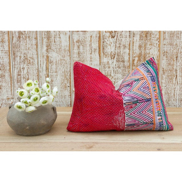 These colorful throw pillows are made from Rabari tribal dowry bags. The embroidery is on cotton and has intricate chain...