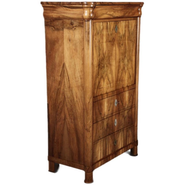 Age and Origin: The secretary desk likely dates from around 1840 and is probably of German origin. Material The secretary...