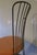 Cast iron garden or patio chair manufactured in the early 20th century. The chair is structurally sound, well-patinated,...